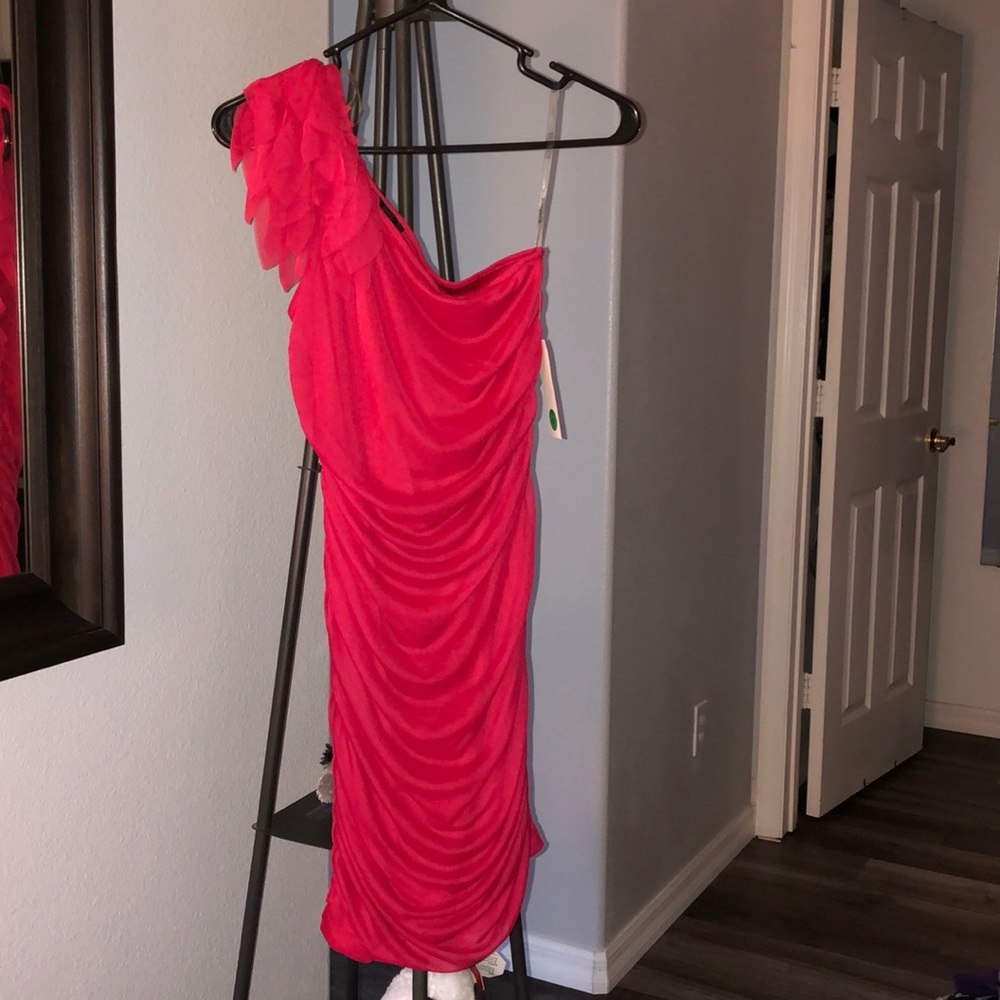 Red one shoulder dress with ruffles on shoulder
